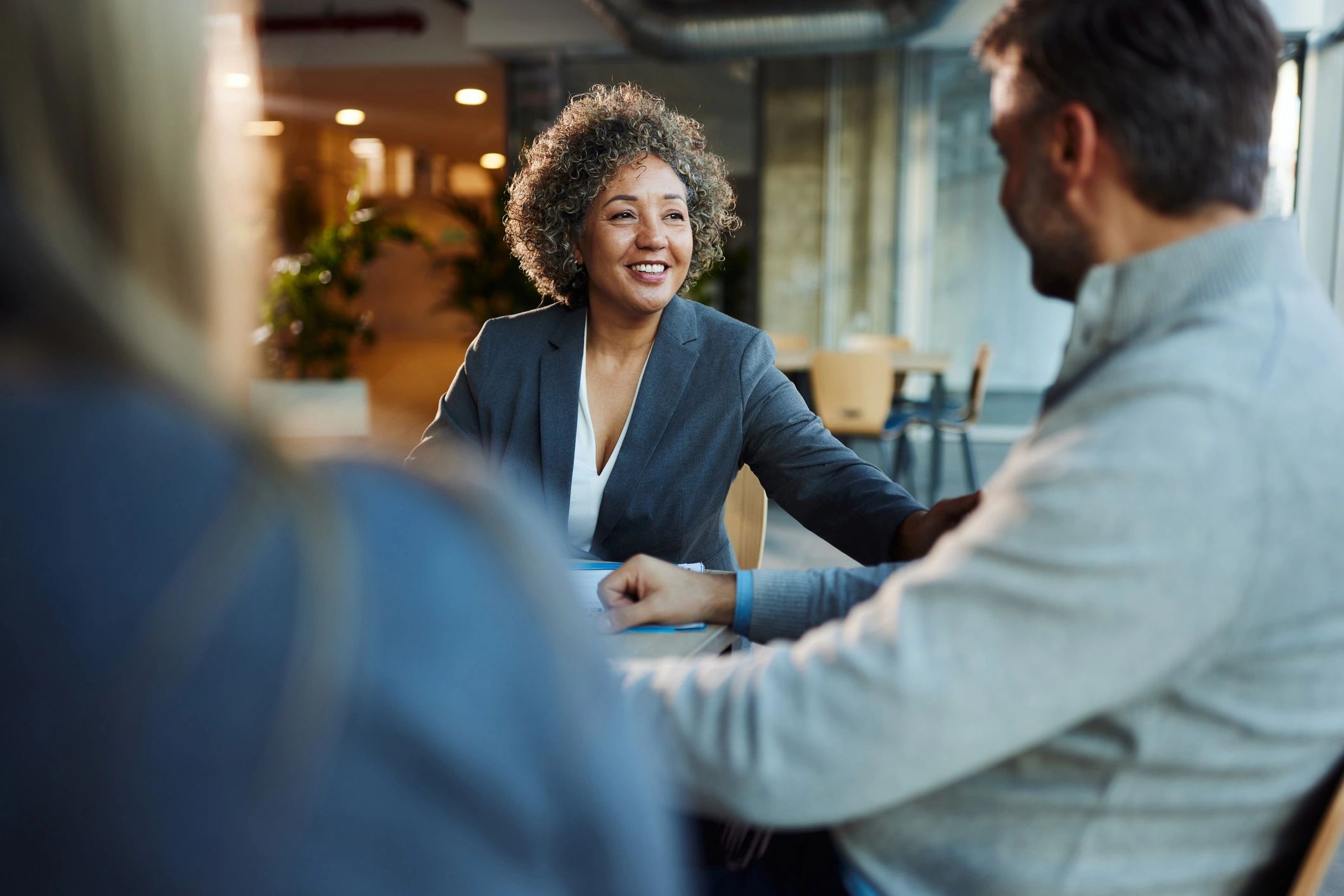 Business consultation meeting at an office table